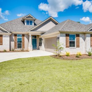 A house with a grass lawn | New Park