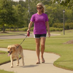Woman walking dog | New Park