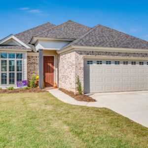 A large lawn in front of a house